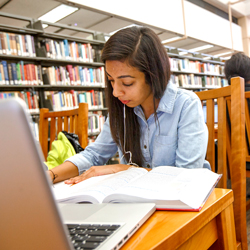 A student studying in the library.